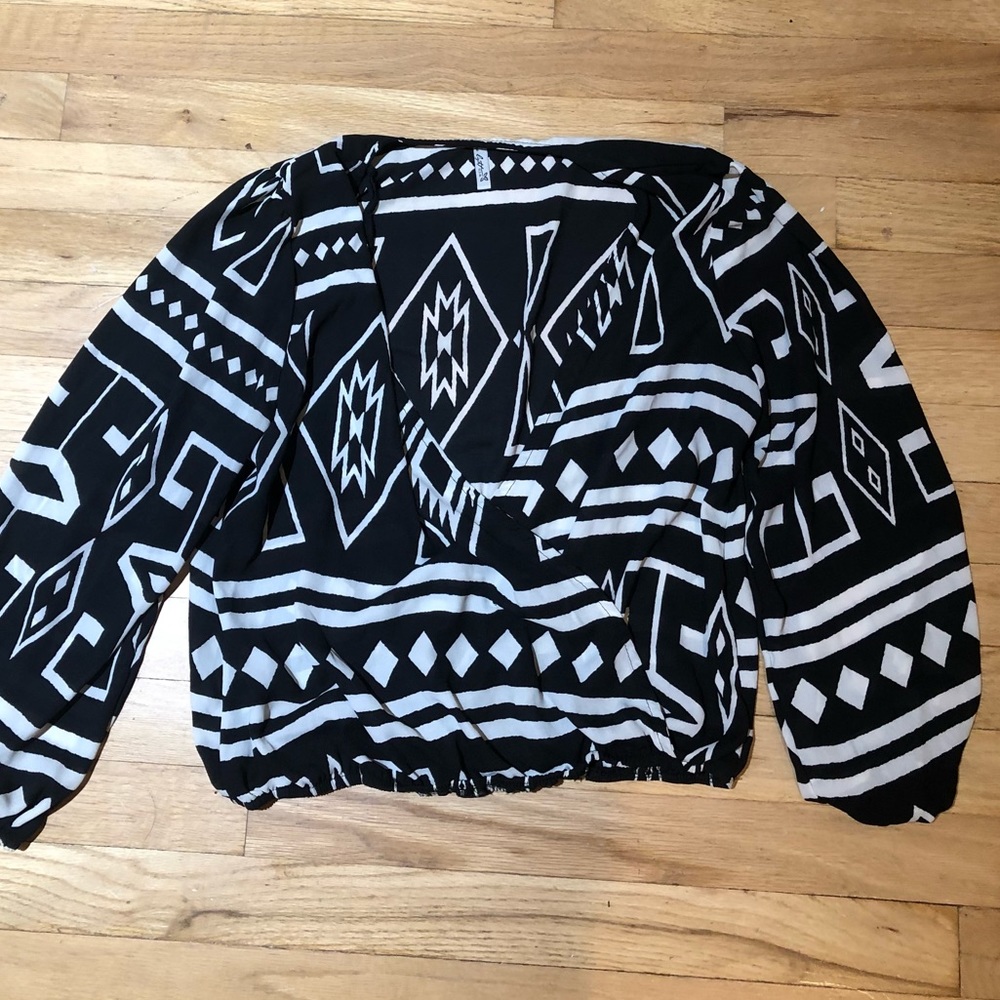 Black and white patterned faux wrap top